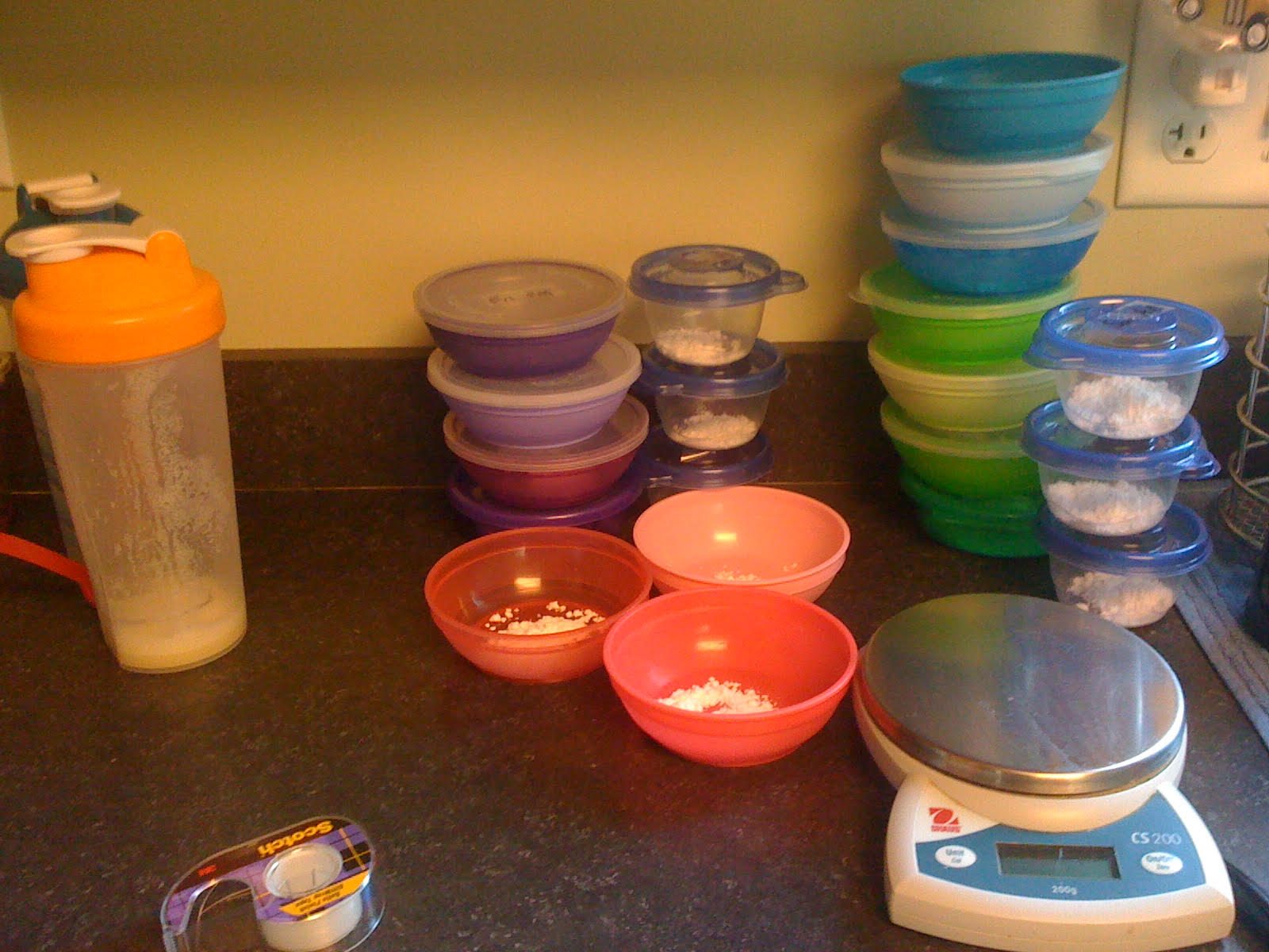 Medicine being measured out on a kitchen counter.