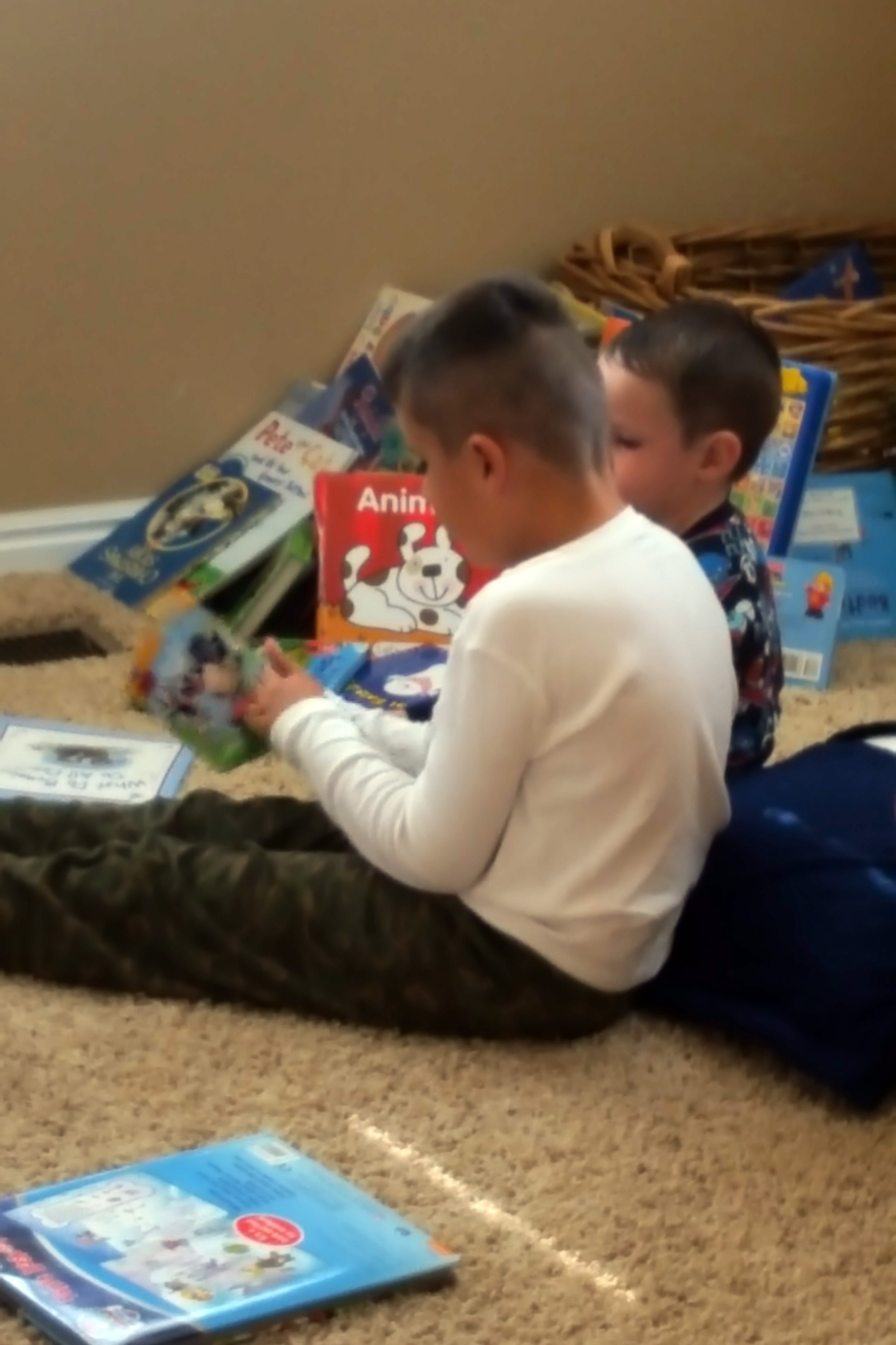 Sawyer and Levi reading books