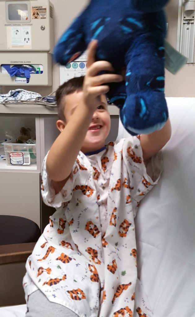 Playing with toy before surgery