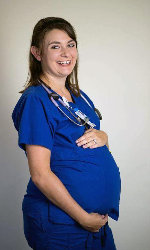 Shelly pregnant in scrubs