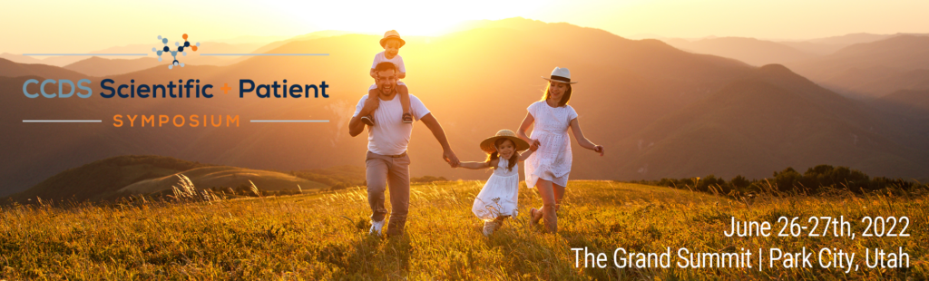 Family running together in a field, text around photo says CCDS symposium