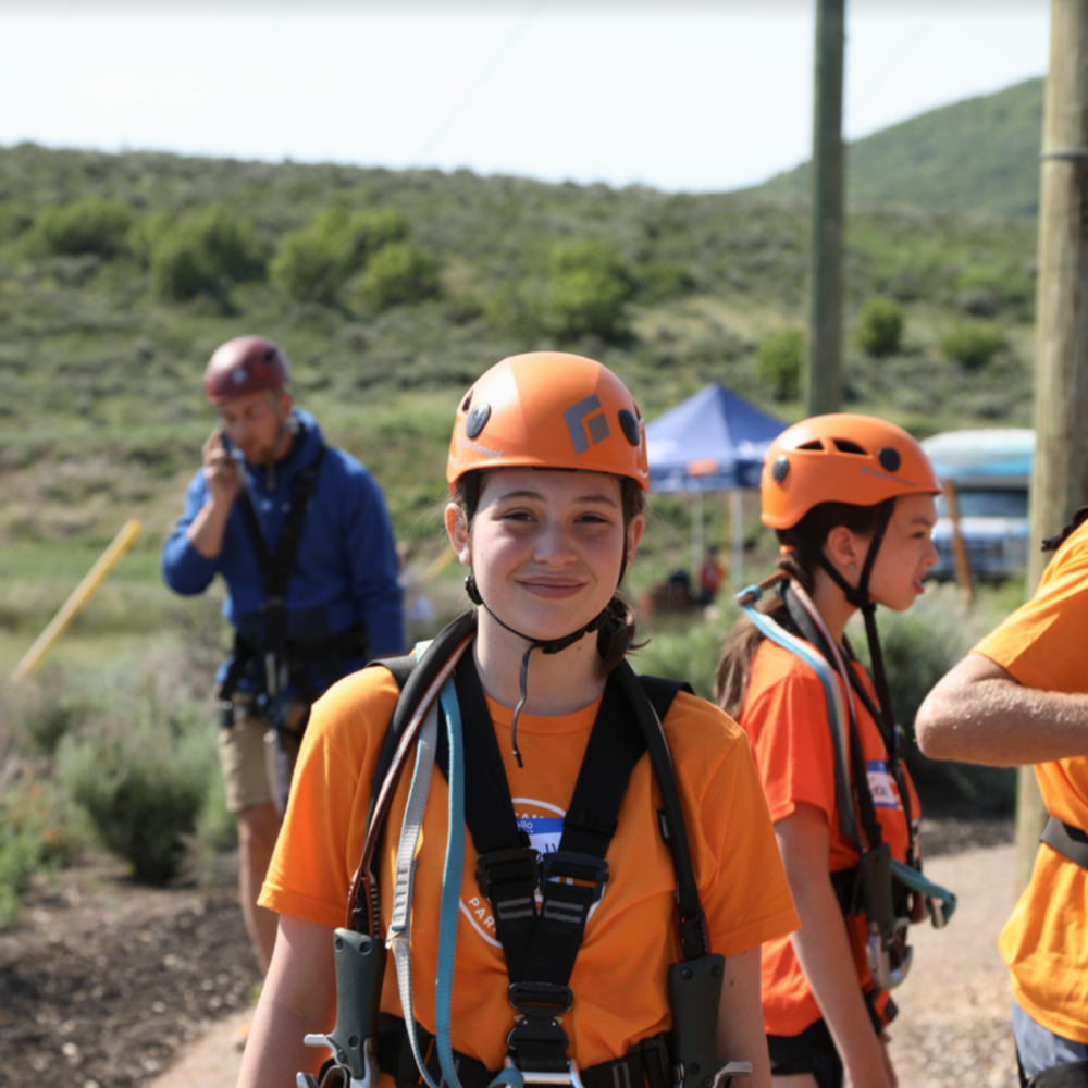 Kids at the symposium on the ropes course.