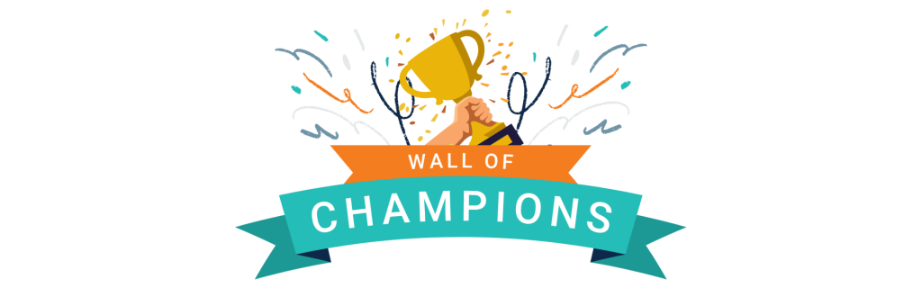 A hand holding a trophy with the words Wall of Champions