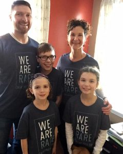 CCDS Day The Robinson family wearing matching shirts that say We Are Rare